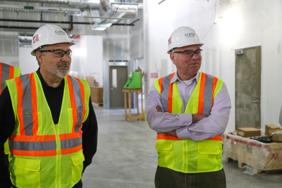 CEO Martin VanTrieste and Sen. Kaine tour the new facility