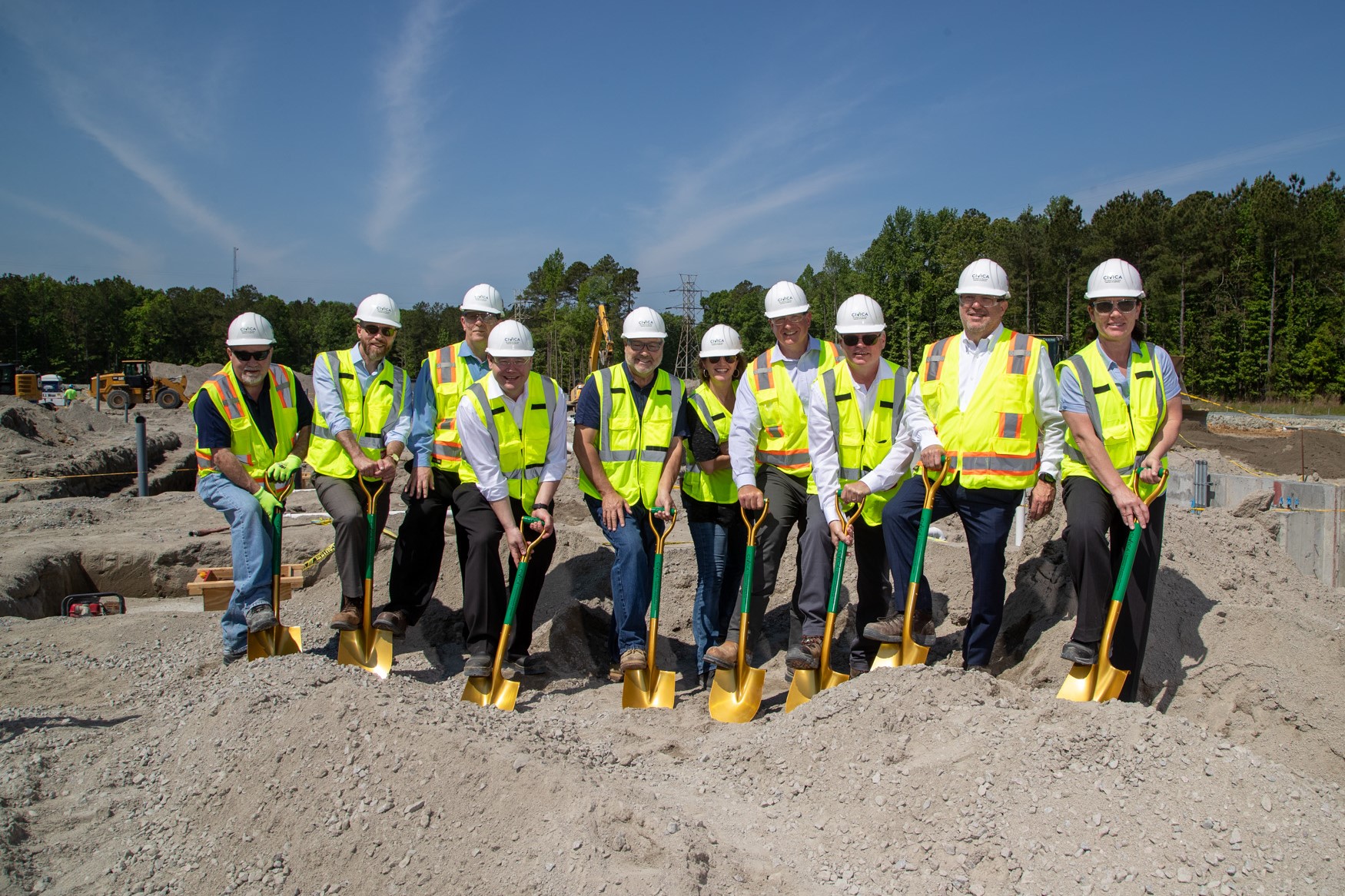 Civica's leadership team manufacturing groundbreaking celebration